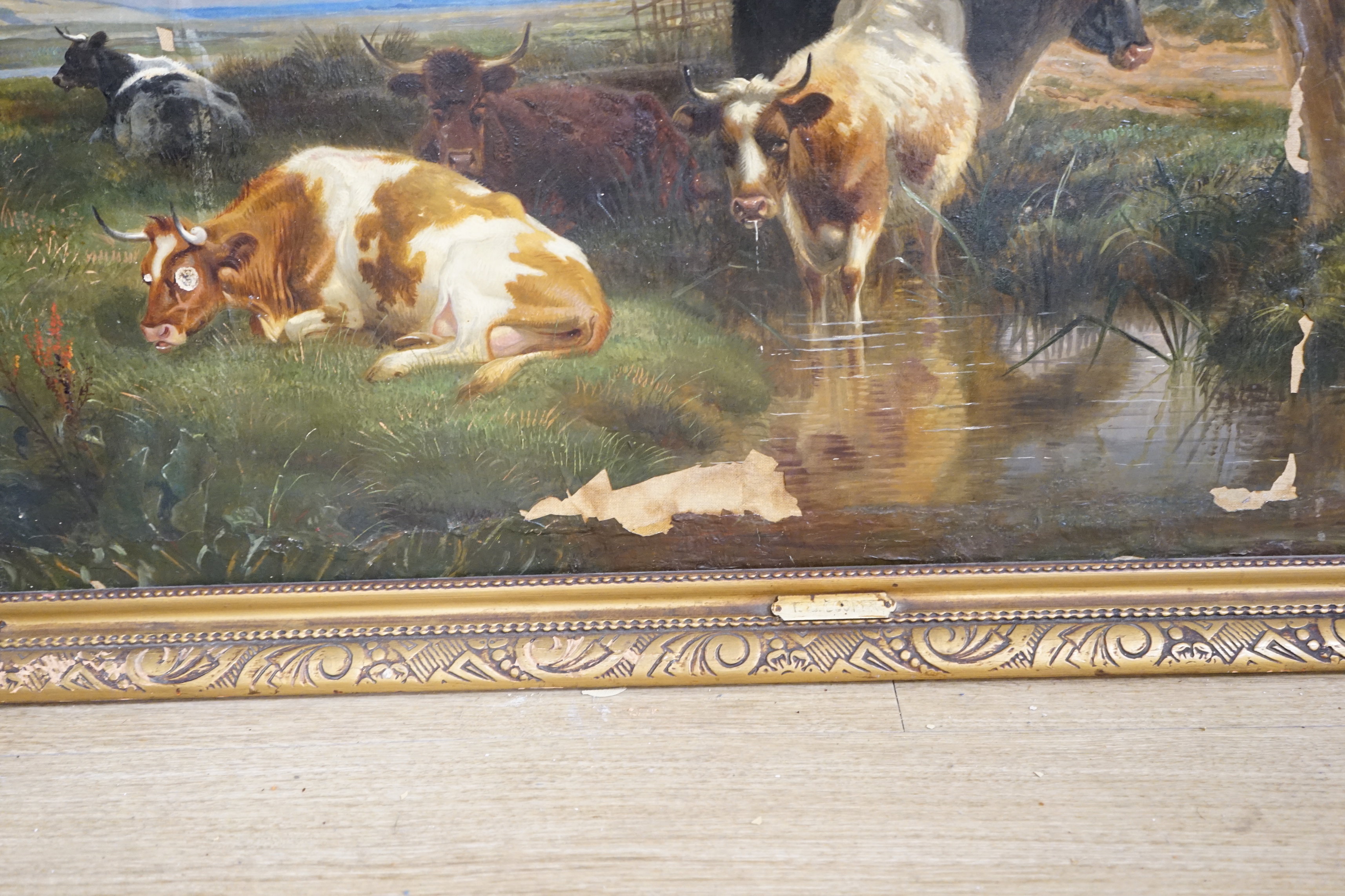 After Thomas Sidney Cooper (1803-1902), oil on canvas, Pastoral landscape with cattle by a pond, inscribed plaque to the frame, 64 x 110cm (badly water damaged)